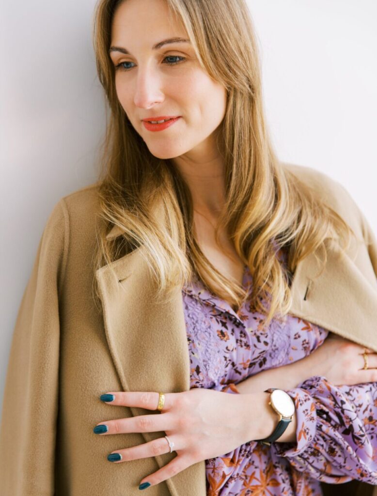 Close up of Astrid wearing a lilac dress and camel MaxMara coat | Ode2style.com