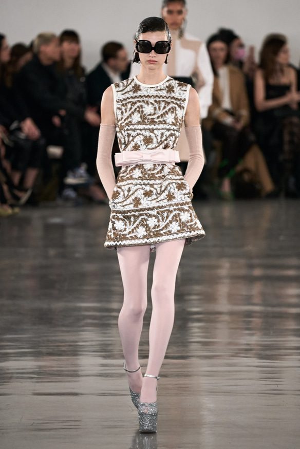 Embroidered with and beige dress with pink pastel stockings and glitter sandals by Giambattista Vali | Ode2style.com