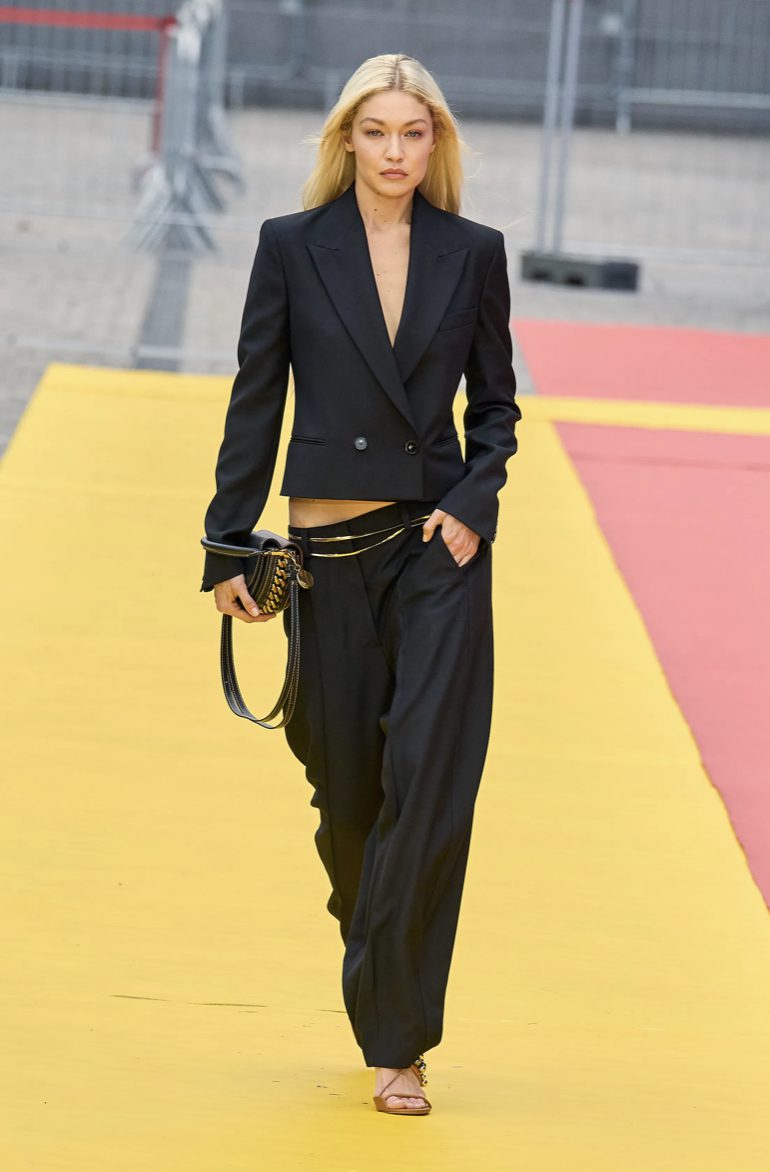 Gigi walking the catwalk in a gorgeous suit look from Stella McCartney SS23 | Ode2style.com